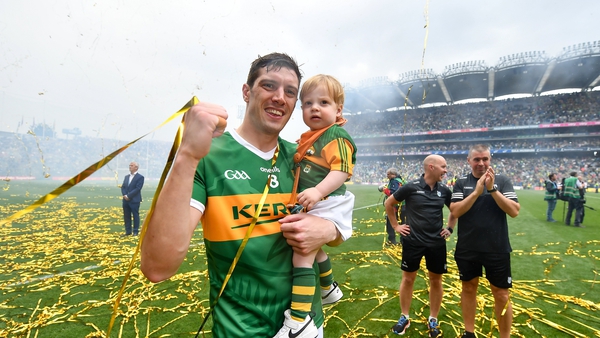 David Moran and his son Eli take in the celebrations at Croke Park after last year's All-Ireland final win over Galway