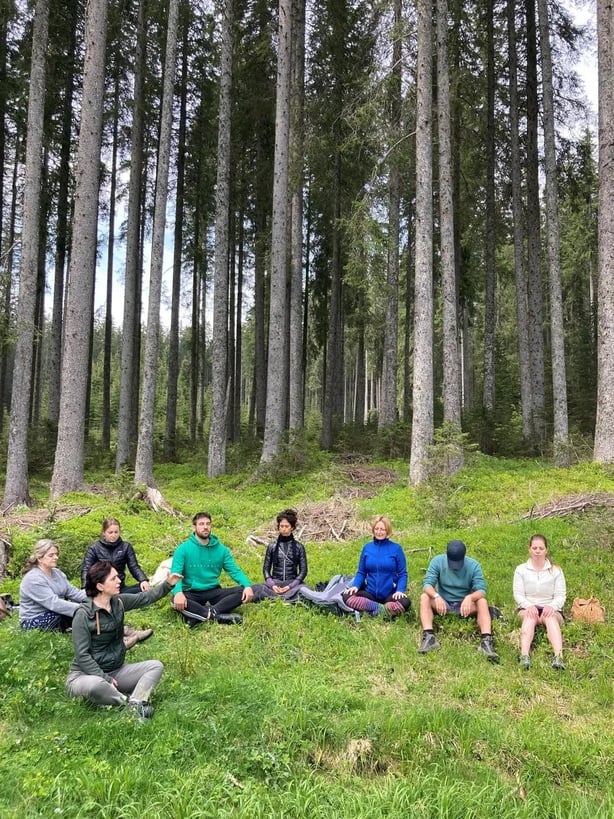 The group breathe in the rejuvenating power of the forest (Hannah Stephenson/PA)