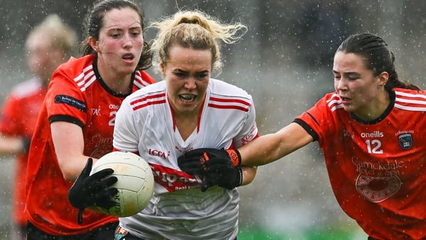 Cork's Katie Quirke is tackled by Emily Druse of Armagh