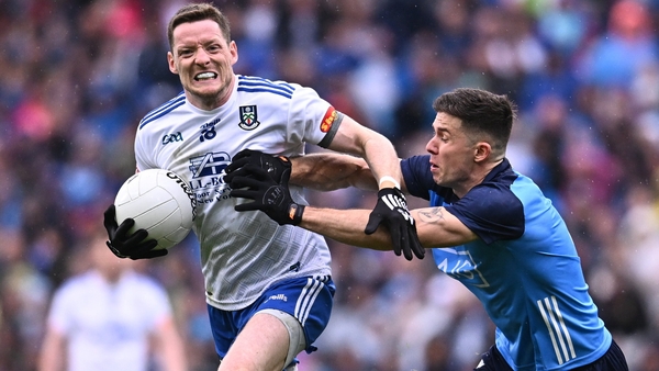 Conor McManus tries to break clear from David Byrne