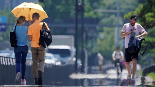 Cities near Tokyo mark 'summer' weather with record high