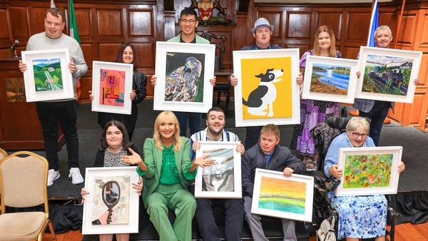 Broadcaster Miriam O'Callaghan is pictured with artists with intellectual disabilities at the Connecting Artists 2023 exhibition, hosted by RCSI in Dublin