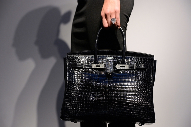 Hermes shiny porosus crocodile birkin hi-res stock photography and