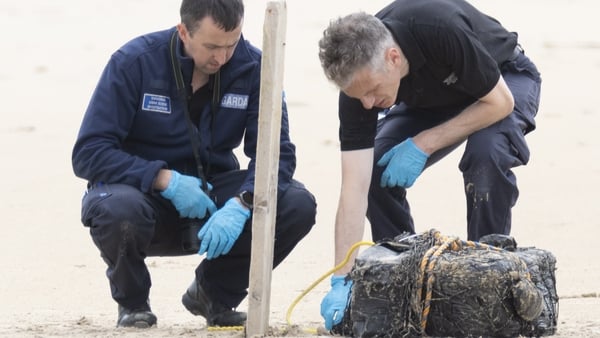 Gardaí examine a package that washed up on a Donegal beach in July