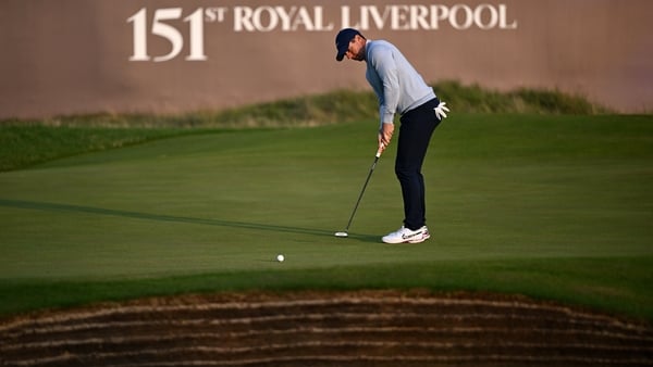 Rory McIlroy putts on the 18th green at Royal Liverpool