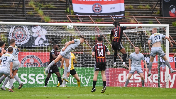 Jonathan Afolabi goes airborne to head Bohs into the second round
