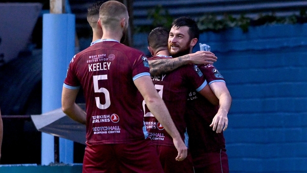 Drogheda United players rush to congratulate Ryan Brennan
