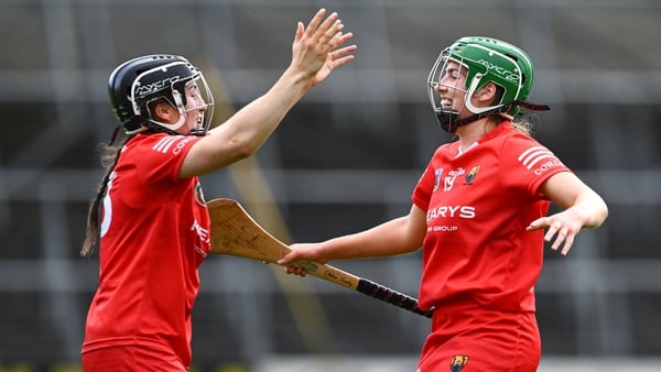 Cork duo Amy O'Connor, left, and Cliona Healy celebrate after their side's victory