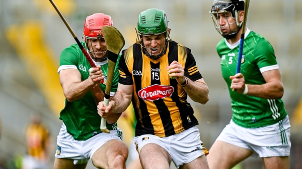 Barry Nash (L) pursues Eoin Cody during the league final