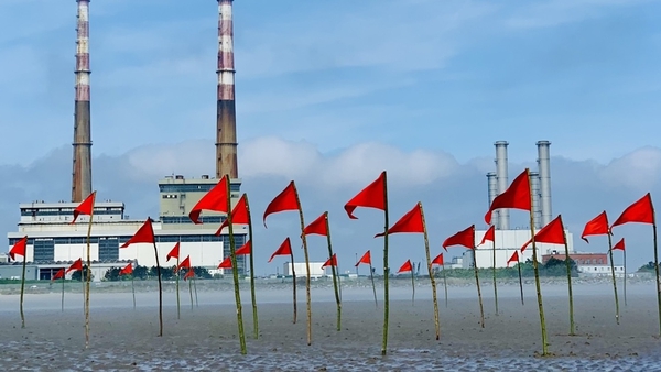 Fergal McCarthy's Red Flags fly on Sandymount beach, Dublin
