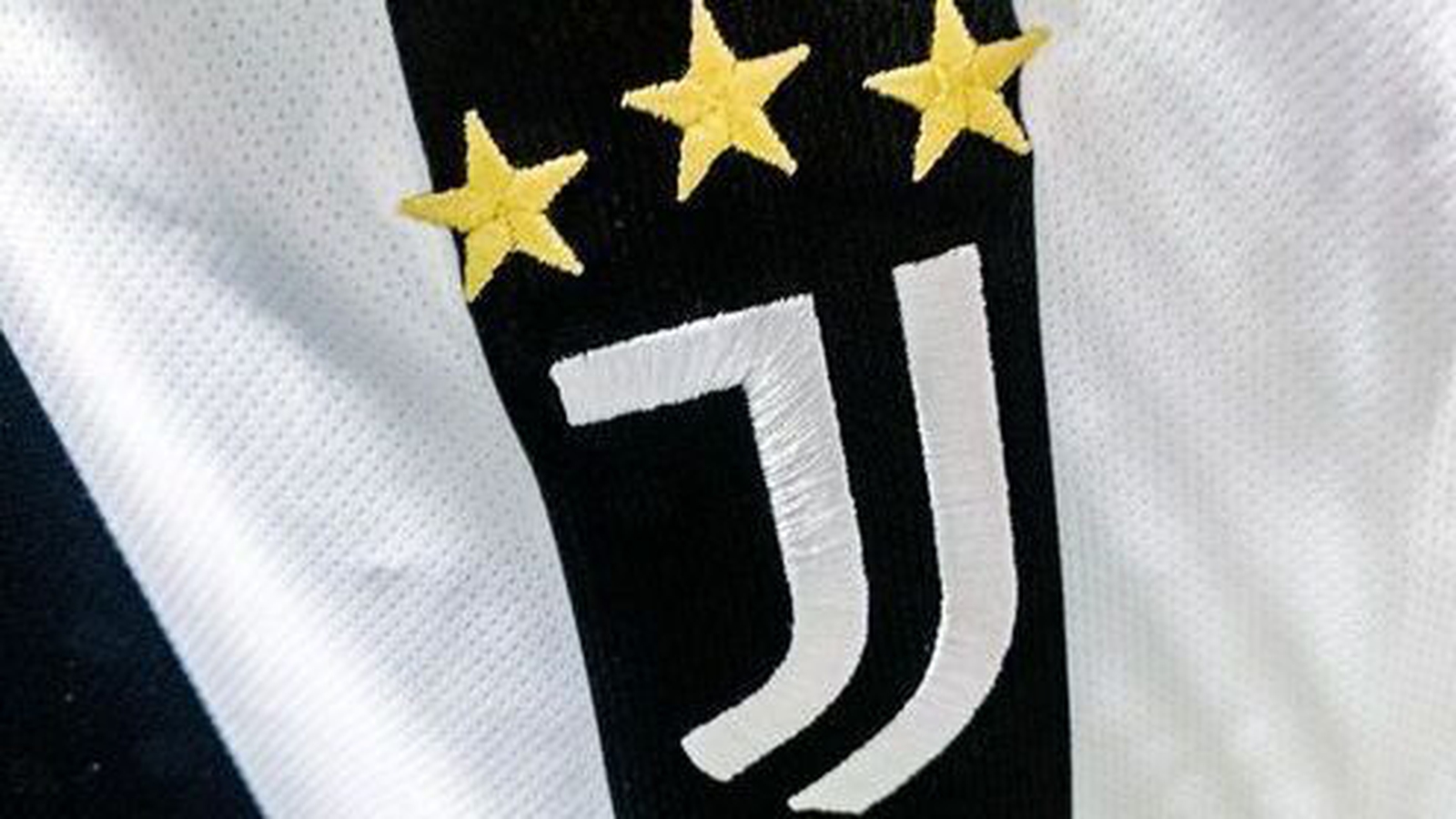 Why do Juventus play in black and white?