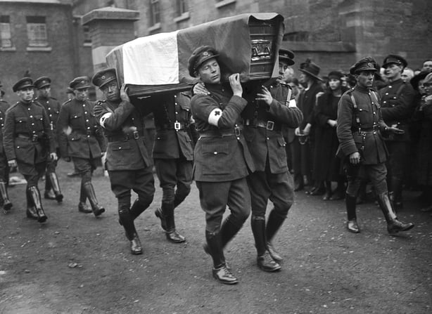 Red Cross men carrying the coffin of one of twelve soldiers who were killed in Dublin during the Irish Civil War
