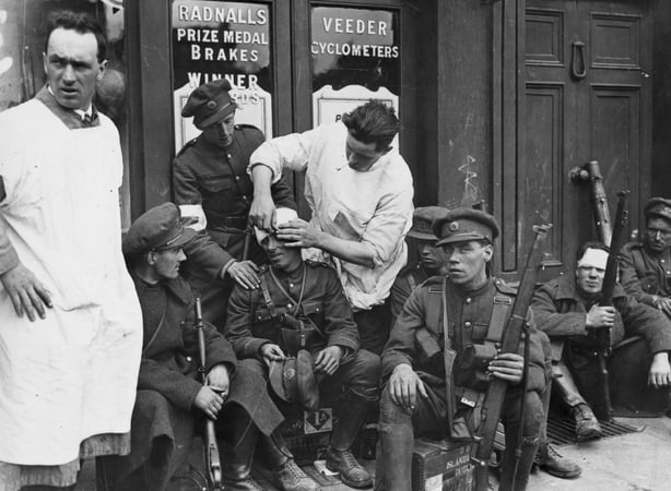 Doctors attending to wounded soldiers after the Battle of Dublin during the Irish Civil War