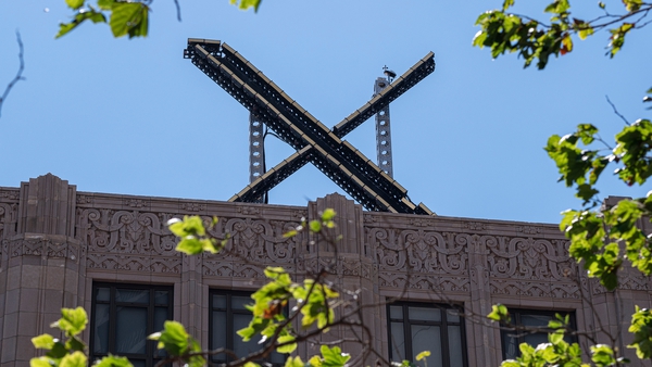 The new Twitter X logo at the company's headquarters in San Francisco