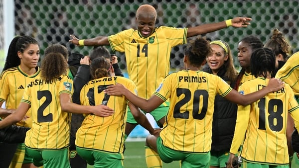 Jamaica celebrate qualifying for the last 16