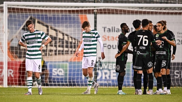 Ronan Finn and Sean Gannon traipse away after Ferencvaros added their second late on