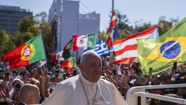 Pope Francis greeted thousands of pilgrims in Lisbon from the Popemobile