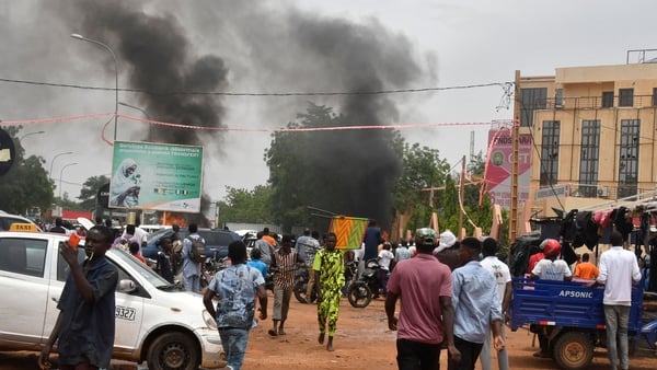 Smoke seen billowing as coup supporters attack the headquarters of the Nigerien Party for Democracy and Socialism