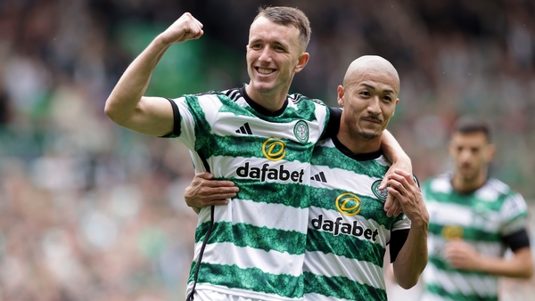 David Turnbull celebrates with Daizen Maeda after scoring the opening goal