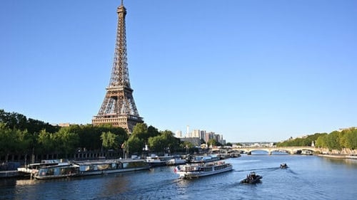 Dress rehearsal for the opening ceremony of the Paris Games as boats parade along the Seine