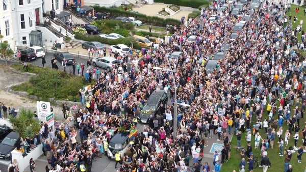 Crowds lined the seafront as the hearse carrying Sinéad O'Connor made its way through Bray and stopped at her former home