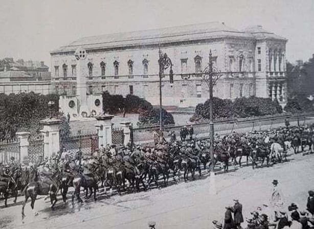 Big military parade in Dublin - Irish cavalry pass the cenotaph erected to the memory of Michael Collins and Arthur Griffith. Photo: Irish Life, September 1923