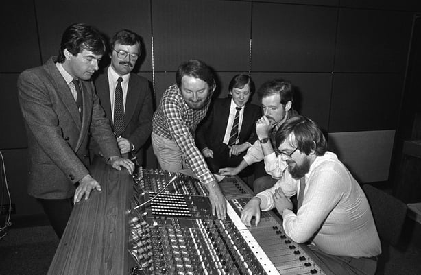 Group shot of RTÉ Radio 2 news presenters including Richard Crowley, Vere Wynne-Jones, Leo Enright, Gerry Reynolds, Conor McAnally and Michael Fisher. Photo by Des Gaffney (1983)  2001/020