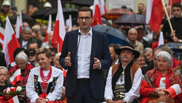 Polish Prime Minister Mateusz Morawiecki speaking to inhabitants of Olkusz, southern Poland in June