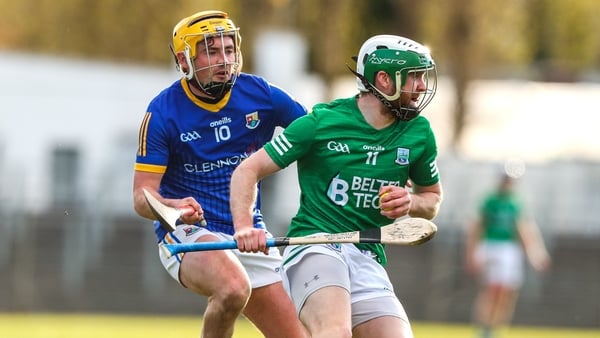 Sean Corrigan (R) was the last man to lift the Fermanagh SHC trophy, all the way back in 2013