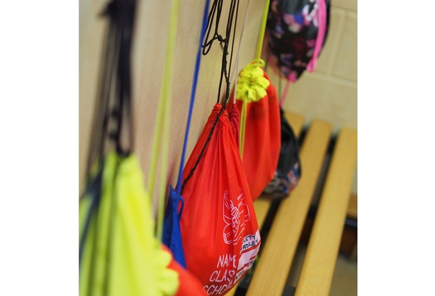Clean PE bags hanging on hooks