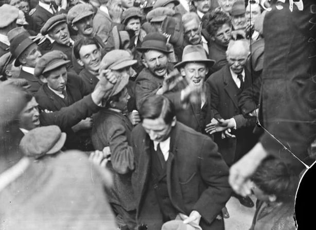 Éamon de Valera being cheered by crowds Photo: National Library of Ireland, INDH556