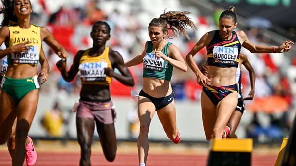 Louise Shanahan, second from right, crosses the finish line to place fifth
