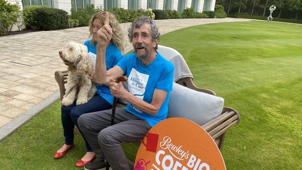 Charlie Bird with his wife Claire and dog Tiger at Powerscourt, Co Wicklow, today