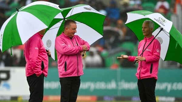 The umpires inspect the pitch at Malahide