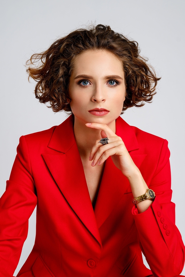Woman with short curly hairstyle