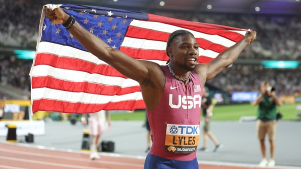 Noah Lyles celebrates victory in the 200m world final in Budapest