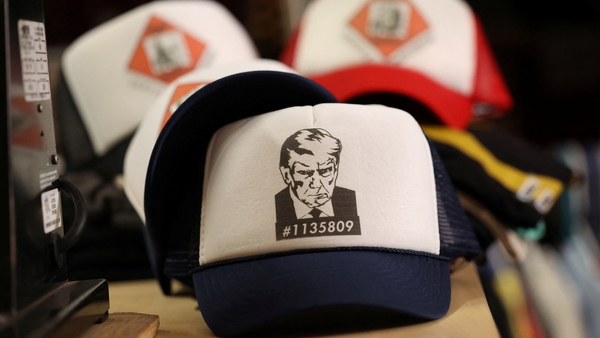 Donald Trump's historic mugshot has appeared on a range of merchandise from T-shirts to cups to baseball caps