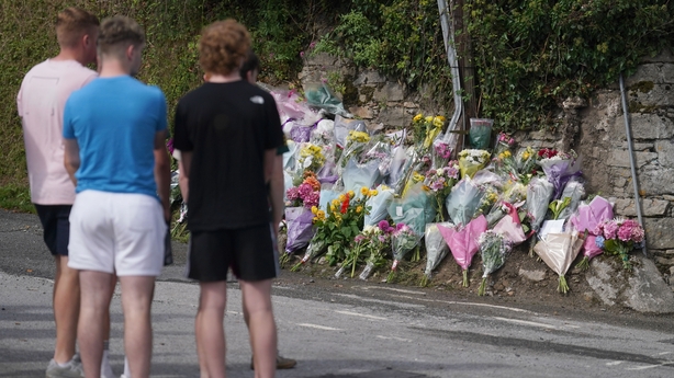 Flowers are left at the scene of the crash in Clonmel