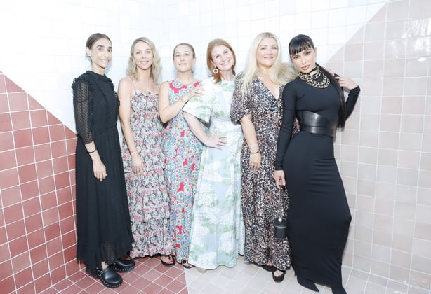Zoe Winkler Reinis, co-founder of This Is About Humanity (CL), Kim Kardashian (R), and guests attends the TIAH 5th Anniversary Soiree