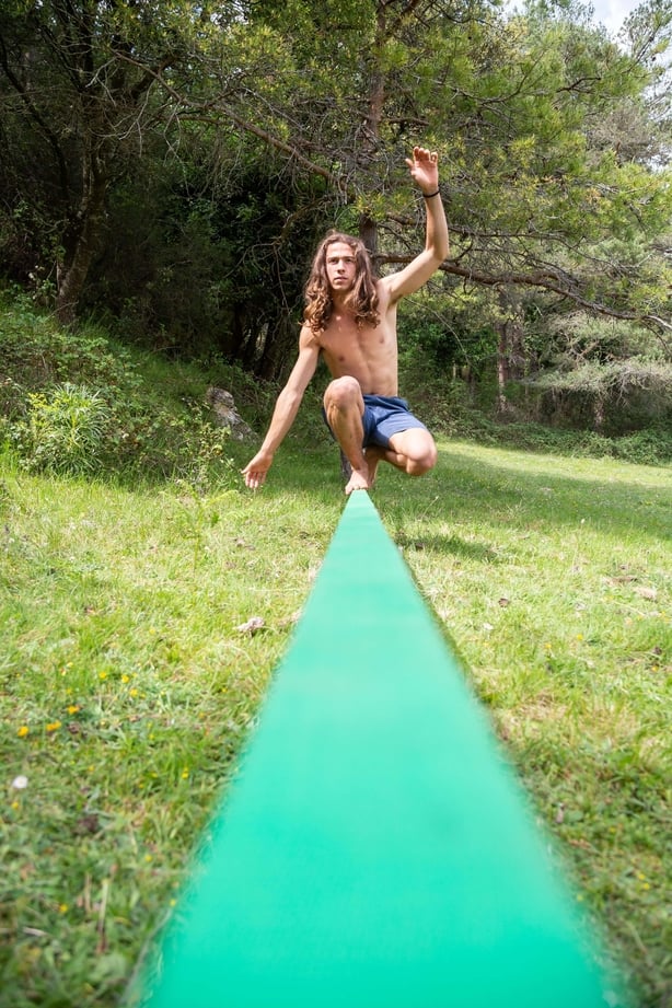 man on balance beam