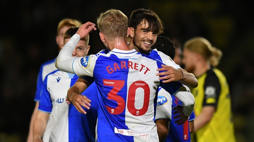 Zak Gilsenan is congratulated by Blackburn Rovers team-mate Jake Garrett after scoring in the 8-0 win over Harrogate Town in the Carabao Cup