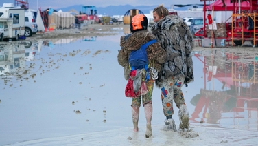Burning Man attendees stranded in desert by rain and mud