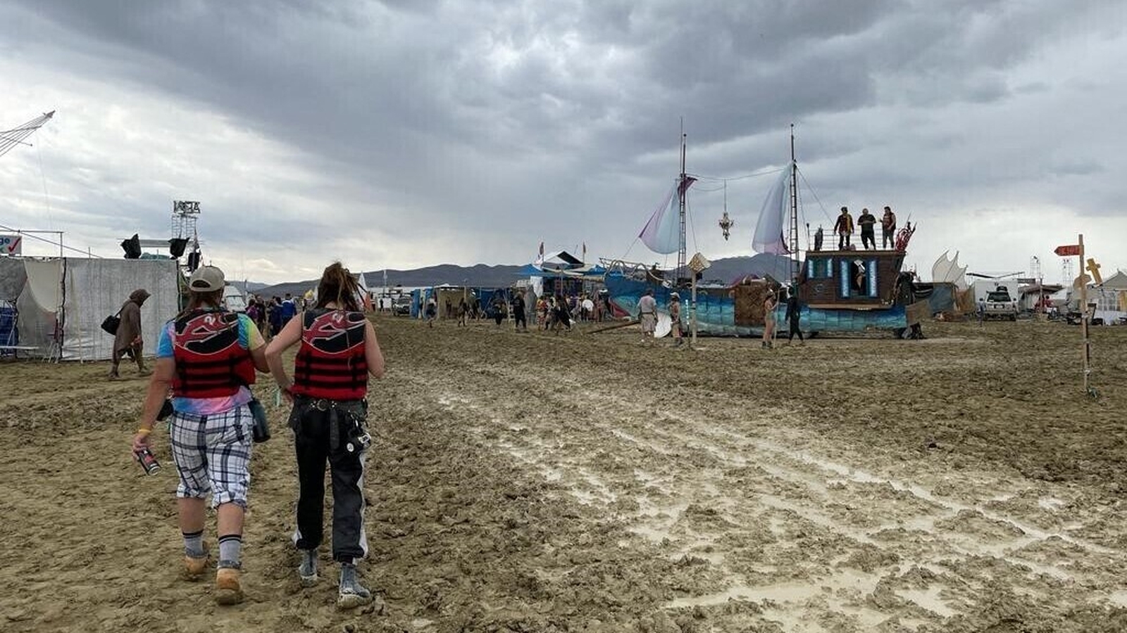 Burning Man festival exodus begins through drying mud