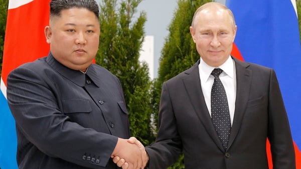 Kim Jong-un and Vladimir Putin shake hands as they pose for pictures prior to their talks in Vladivostok in April 2019 (file image)