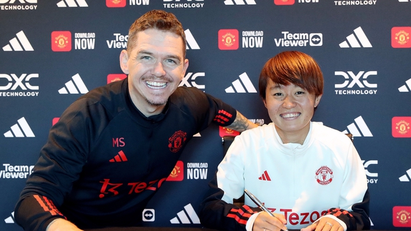 Hinata Miyazawa with manager Marc Skinner as she pens a permanent deal