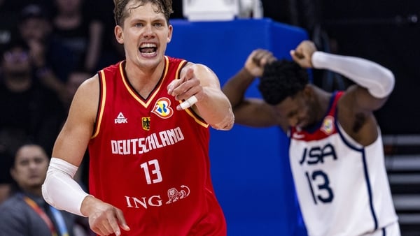 Moritz Wagner (L) of Germany celebrates after scoring