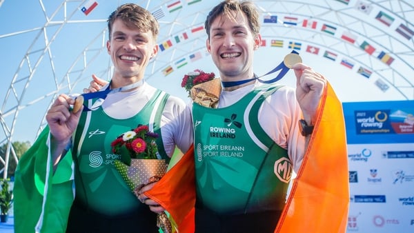 Fintan McCarthy (L) and Paul O'Donovan of Ireland celebrate after winning gold in the lightweight men's double sculls final