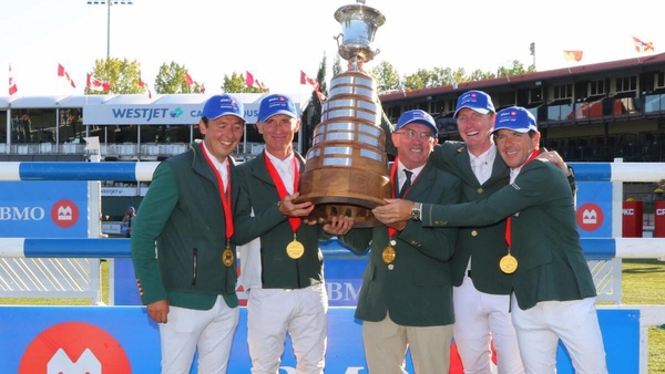 (L-R) Bertram Allen, Denis Lynch, team manager Michael Blake, Daniel Coyle and Conor Swail hold the trophy aloft after victory in the BMO Nations Cup