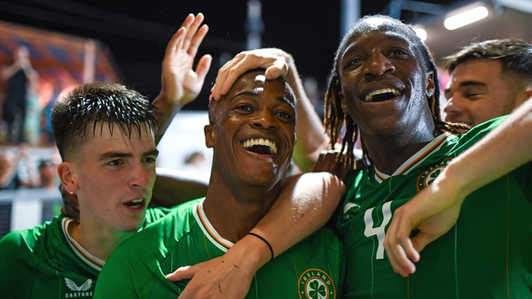 Aidomo Emakhu of Republic of Ireland celebrates with team-mates Andrew Moran and Bosun Lawal after scoring the winner against Turkey