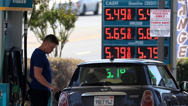 A spike in gas prices boosted sales at US service stations last month, new figures show today